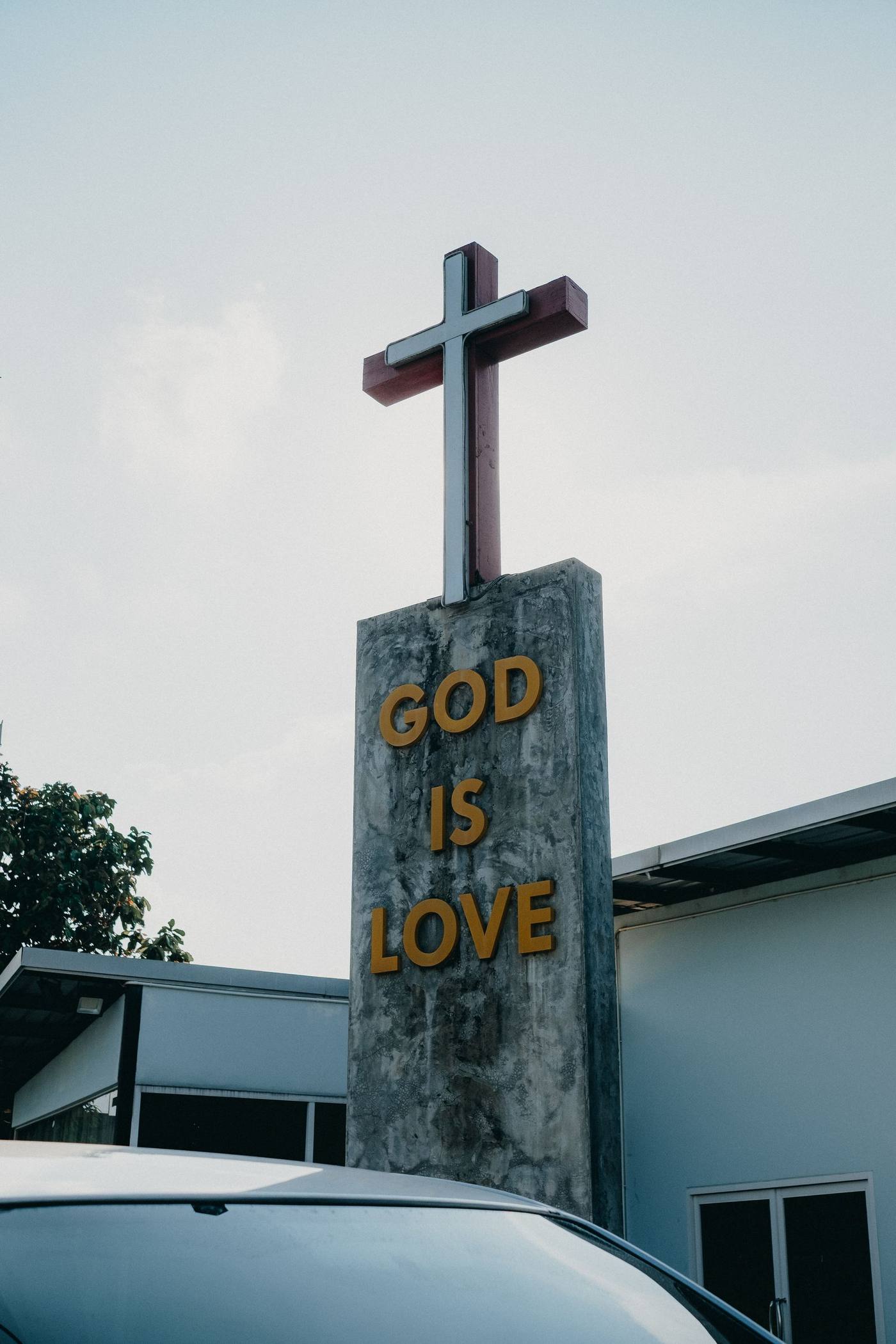 A cross reading God Is Love