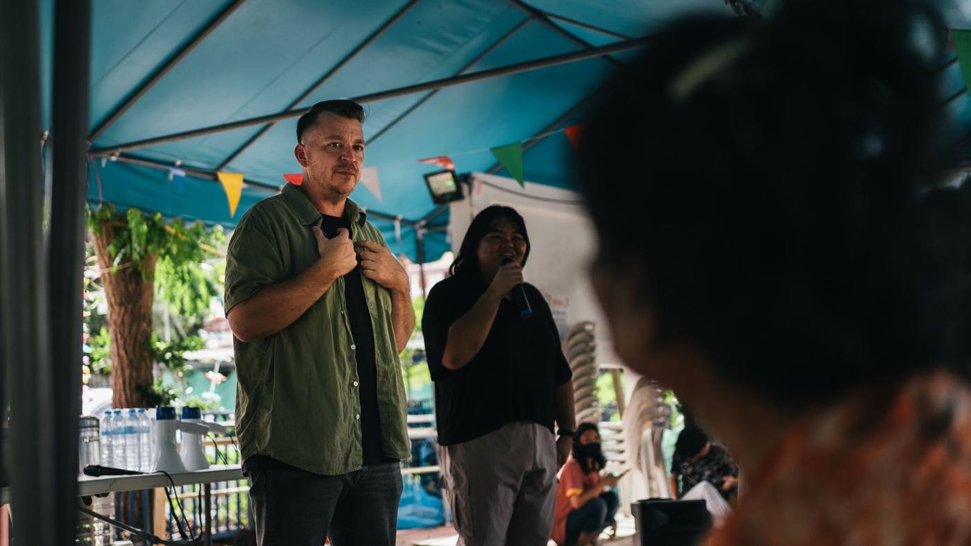 Speaking at a community gathering
